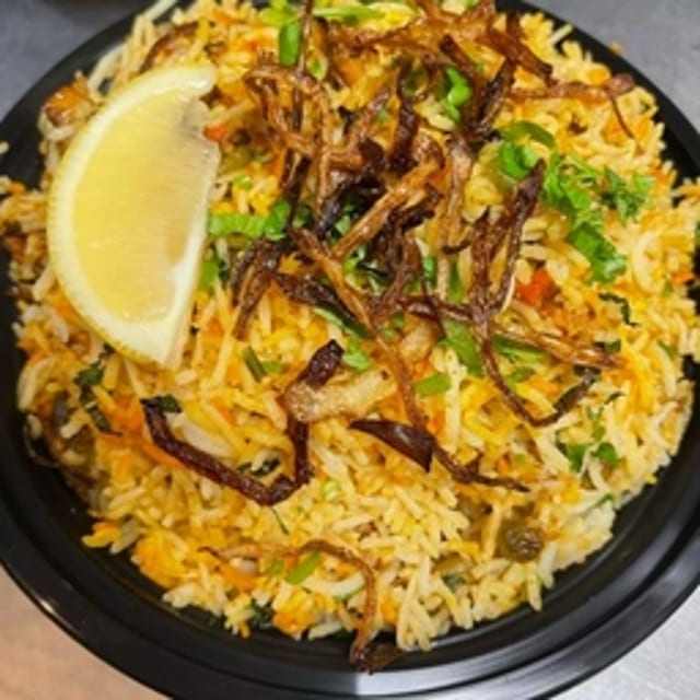 Veg-Hyderabad Dum Pot Biryani.